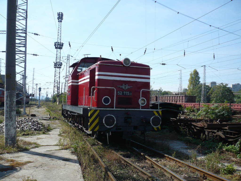 52 115.3