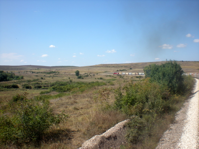 Лок 07-124 бутаща на влак 83504